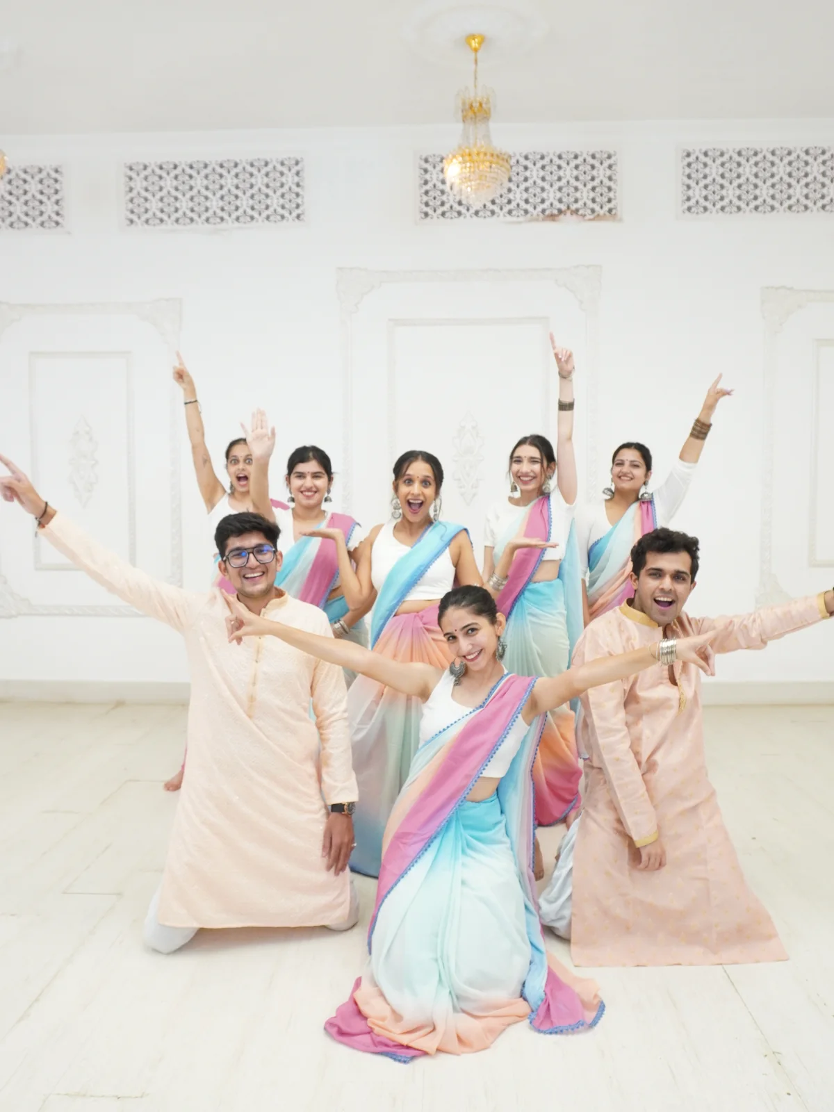 The Nirmiti Jhaveri Productions team in coordinated sangeet outfits